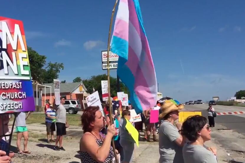 Activists protested Stedfast Baptist Church in 2019. The church moved to Watauga this year...