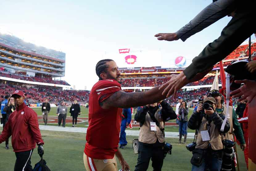 FILE - In this Jan. 1, 2017, file photo, San Francisco 49ers quarterback Colin Kaepernick...
