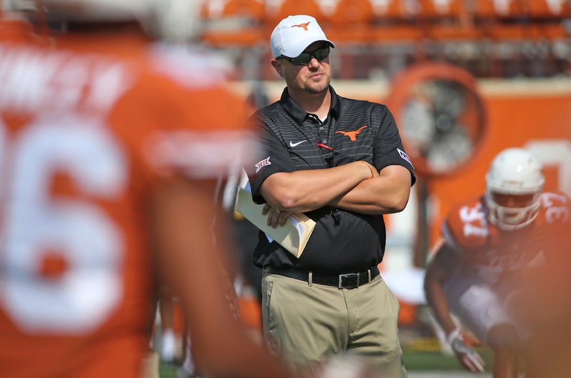 University of Texas Longhorns head coach Tom Herman is pictured during warmups before the...