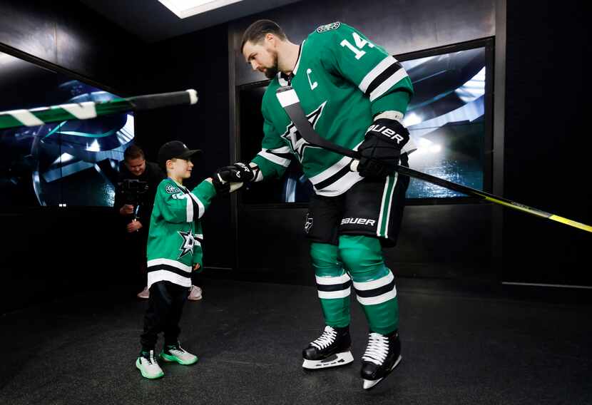 Carson Beaulne, 6, of Ottawa got to meet the Dallas Stars players, including Jamie Benn (14)...