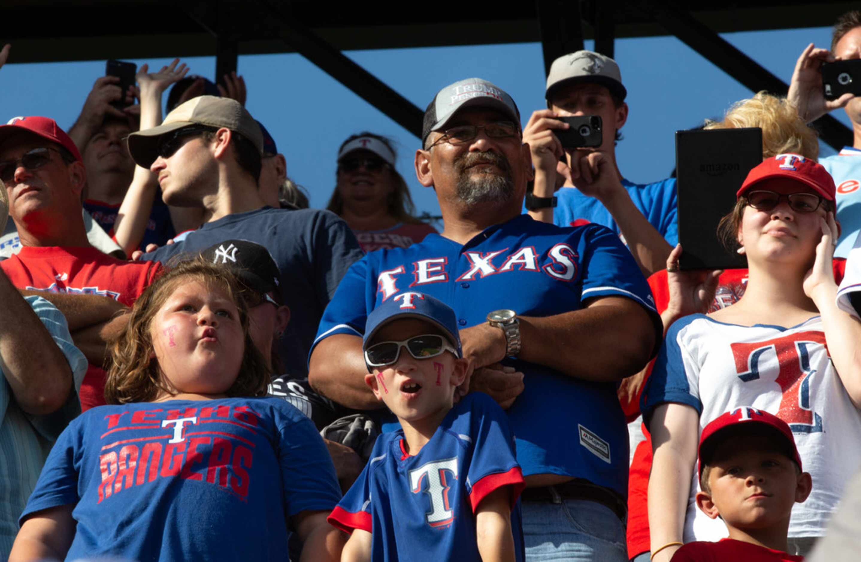 Fans wait for the final out during the Texas Rangers' final game ever played at Globe Life...
