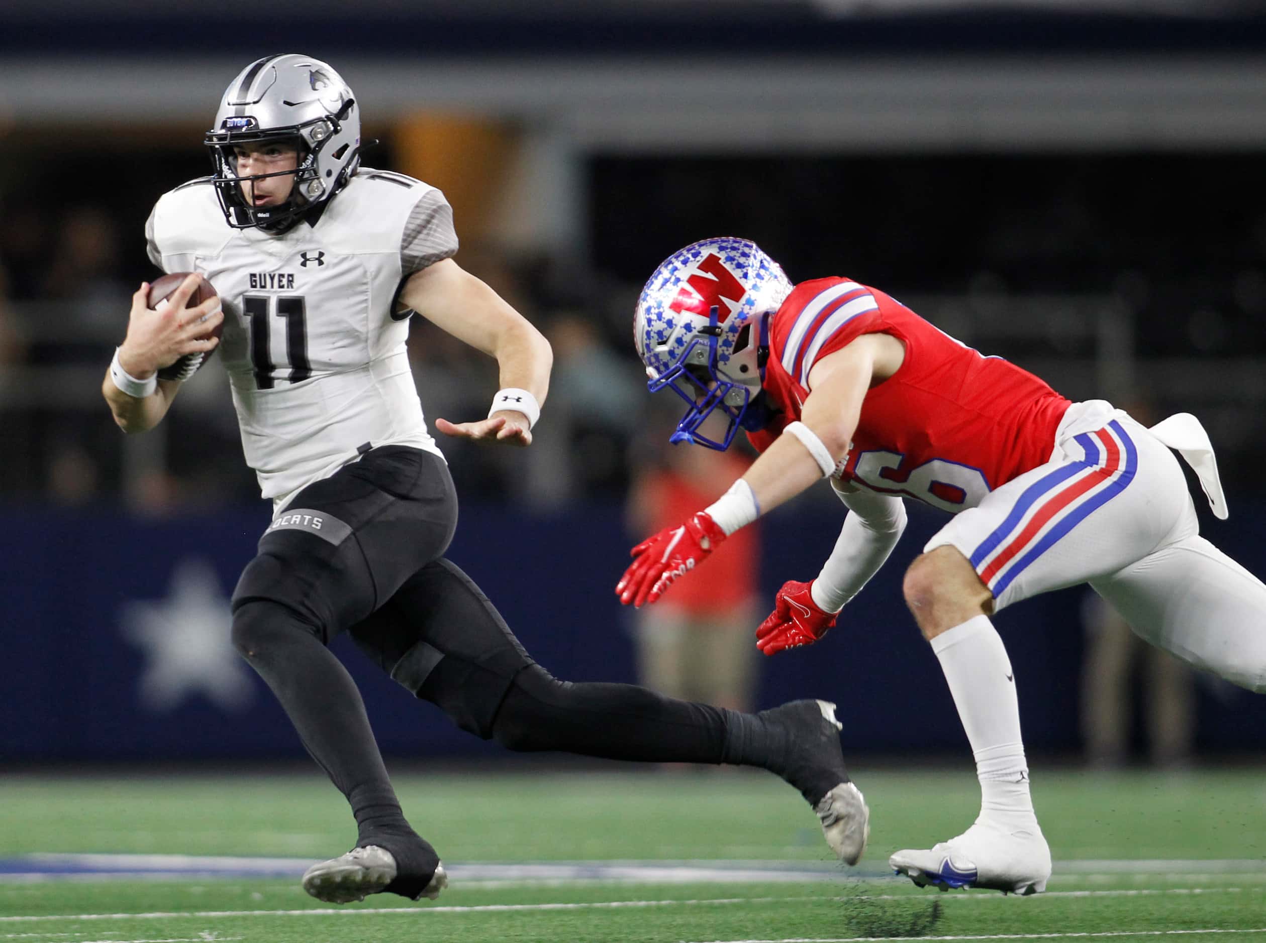 Denton Guyer quarterback Jackson Arnold (11) scrambles out of the backfield to avoid the...