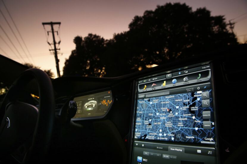 The digital console of Brad Holt's all-electric Tesla Model S is equipped with a touch...