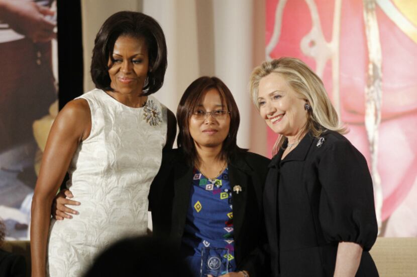 Secretary of State Hillary Rodham Clinton and first lady Michelle Obama present the 2012...