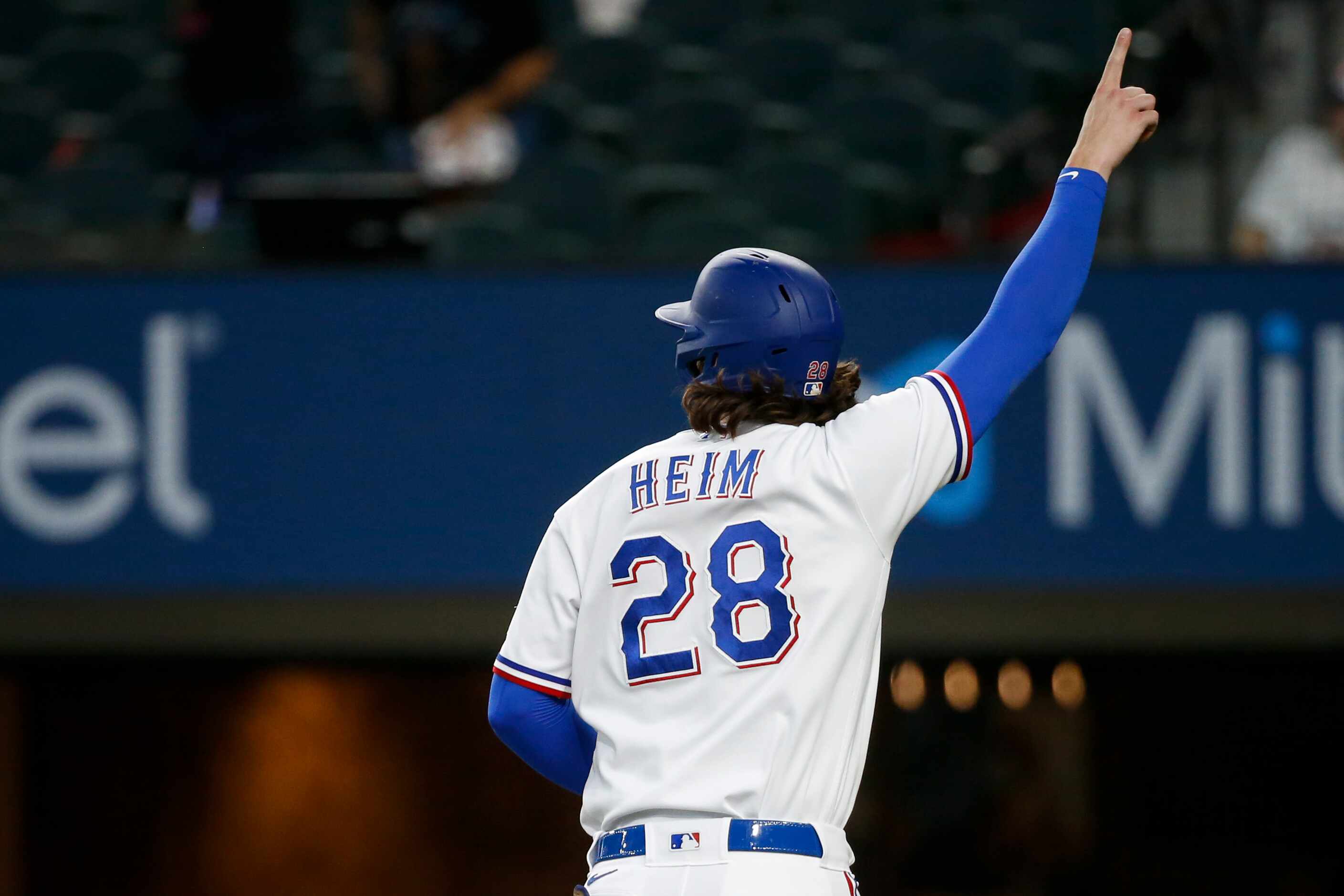 Texas Rangers catcher Jonah Heim (28) celebrates a home run by Texas Rangers left fielder...