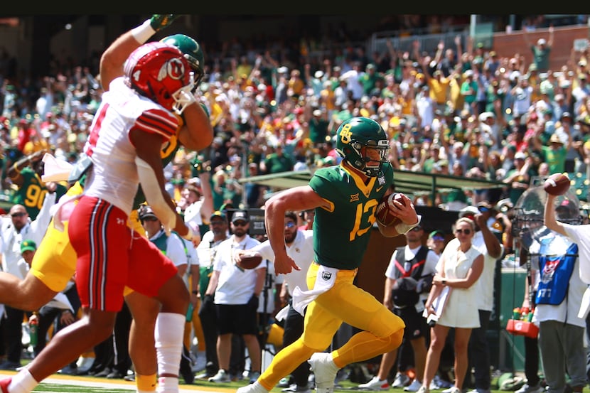 Baylor quarterback Sawyer Robertson runs past the Utah defense to score during an NCAA...