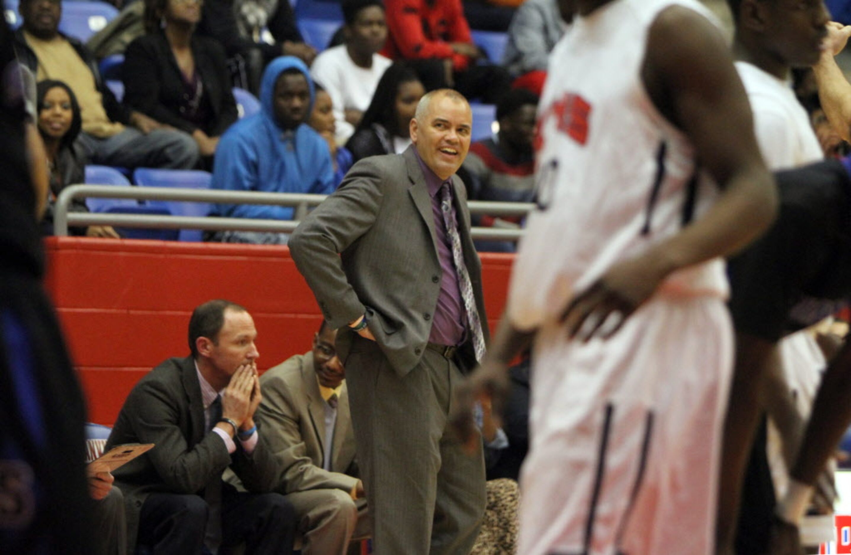 Mansfield Summit head coach Jason Mutterer flashes a smile in disbelief after his team was...