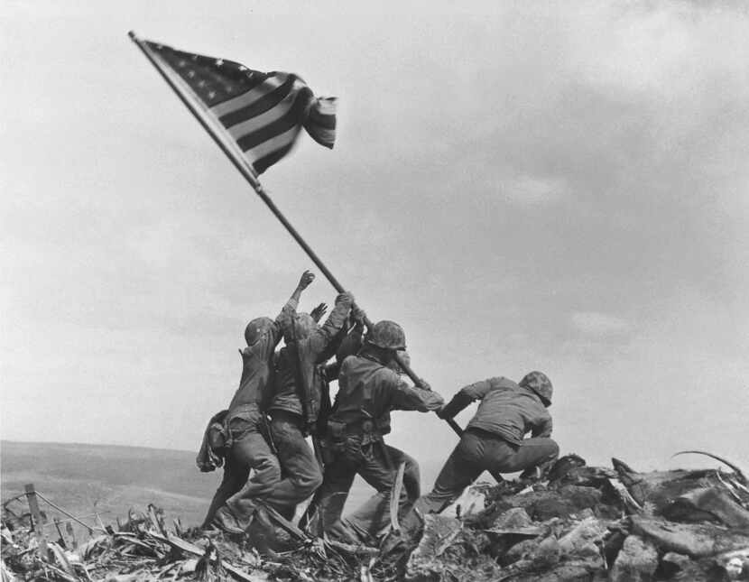 The book includes some iconic photos, such as Joe Rosenthal's "Raising the Flag on Iwo...