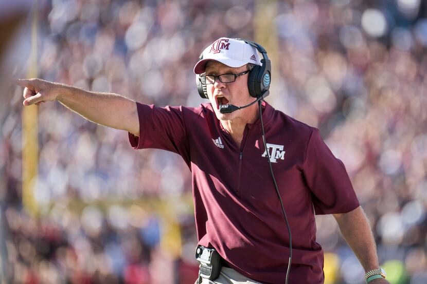 FILE - In this Oct. 13, 2018, file photo, Texas A&M head coach Jimbo Fisher directs with...