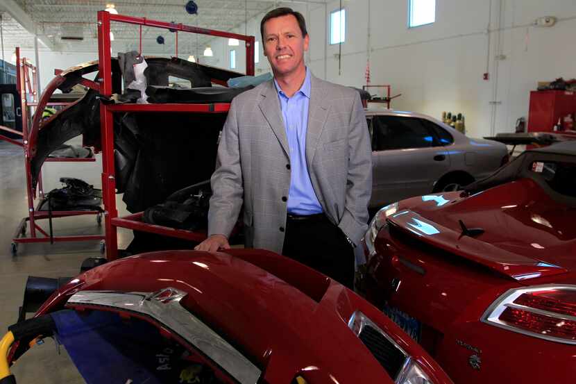 Steve Grimshaw, CEO of Caliber Collision Centers, stands in the body shop at the company's...