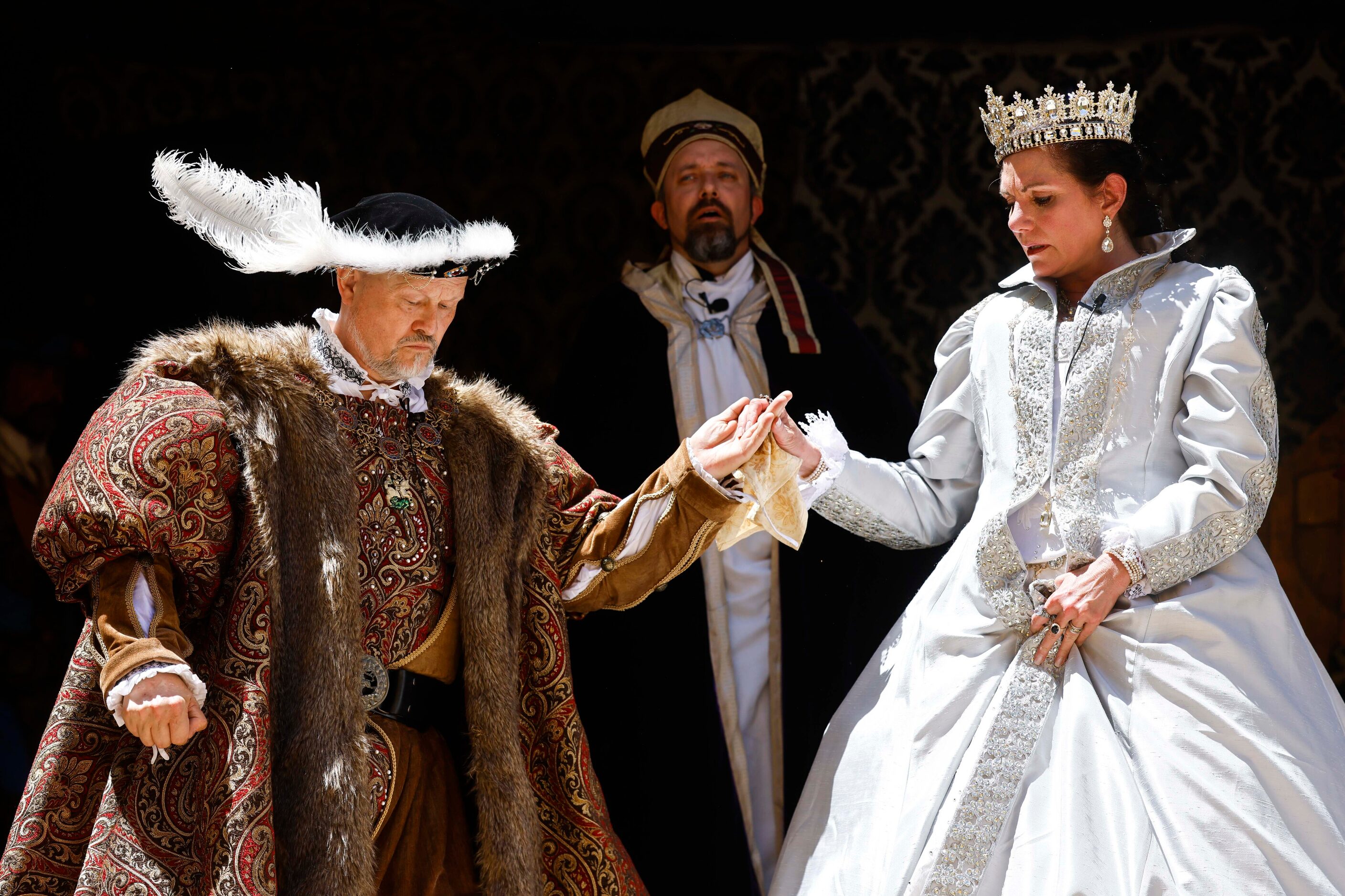 Mick Moreau (left), playing King Henry VIII, and Janna Zepp, playing Queen Catherine Parr...