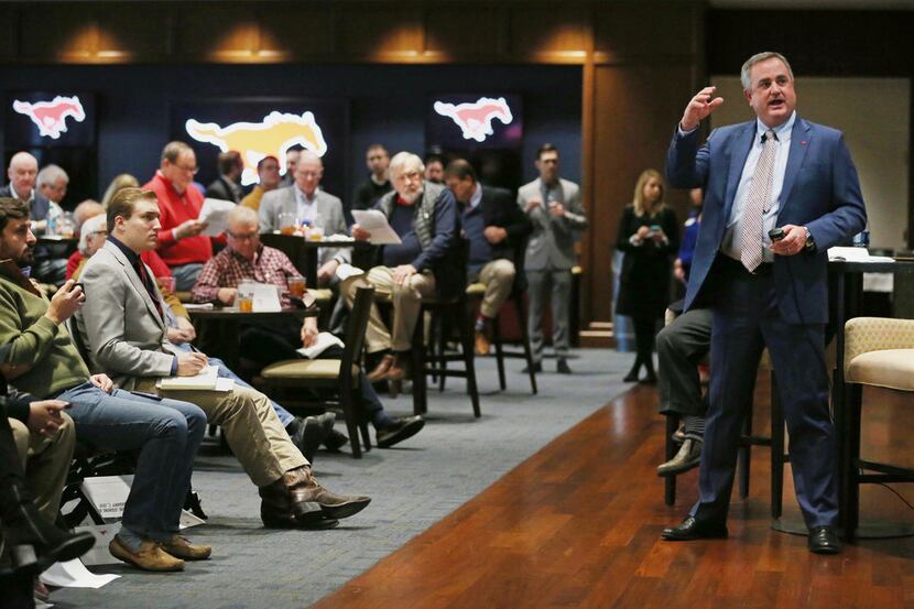 New SMU head football coach Sonny Dykes speaks with Dallas Cowboys play-by-play voice Brad...