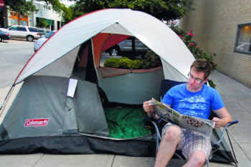  Justin Wagoner was already camping out in front of the Apple Store on Knox Street midweek....