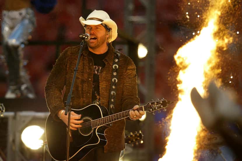 Toby Keith performs during halftime of the Dallas Cowboys loss to the Miami Dolphins,...