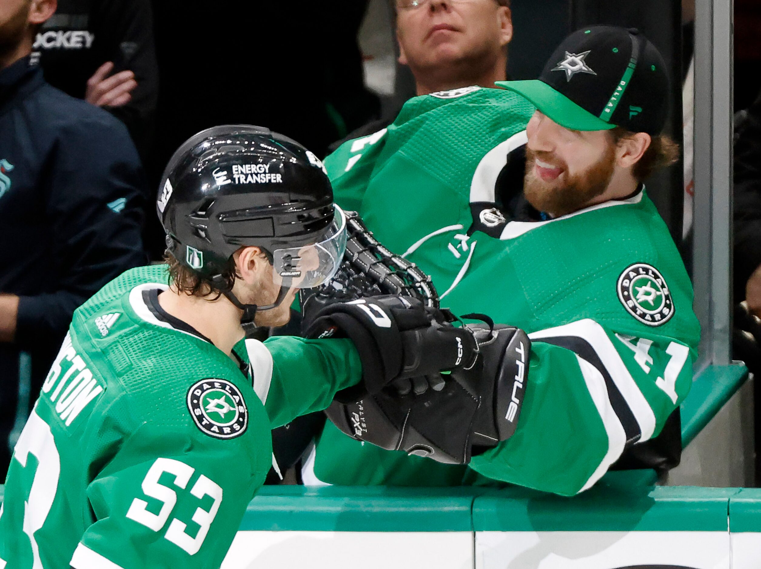 Dallas Stars center Wyatt Johnston (53) is congratulated by Dallas Stars backup goaltender...