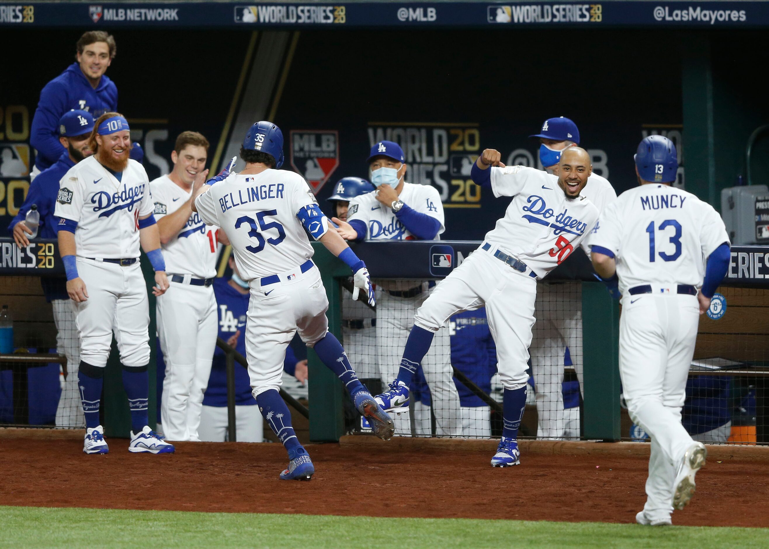 Los Angeles Dodgers right fielder Mookie Betts (50) celebrates with Los Angeles Dodgers...