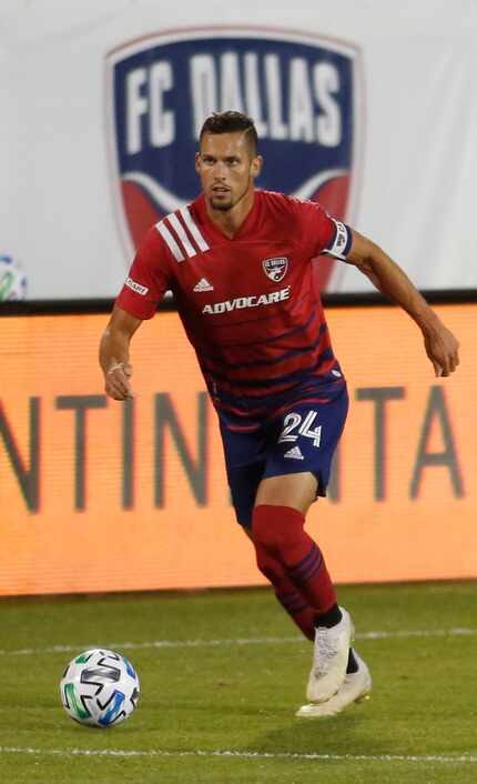 FC Dallas defender Matt Hedges (24) looks for an open team member during first half action...