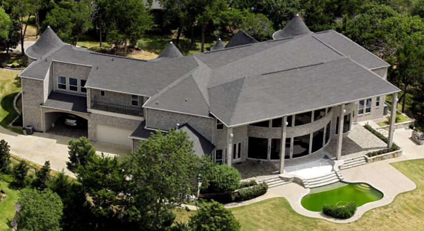 Dr. Tariq Mahmood owns a 10,000-square-foot house in Cedar Hill.