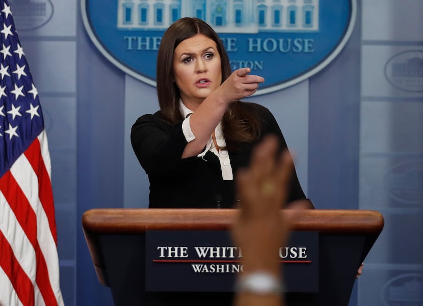 White House press secretary Sarah Huckabee Sanders pointed to a reporter during the daily...