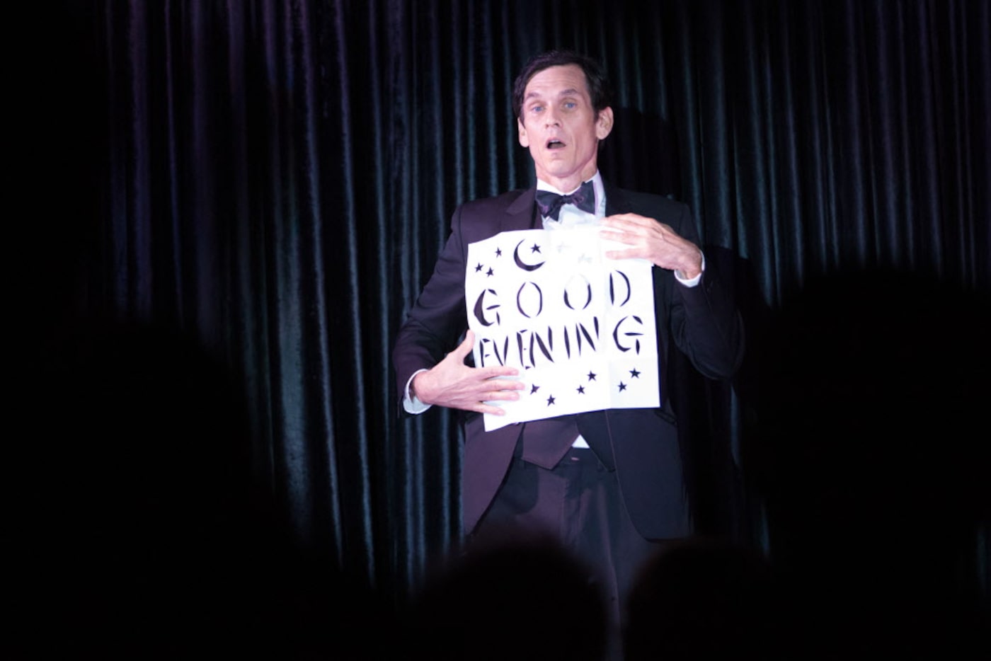 Rob Zabrecky performs on stage at the Peacock Theater, a small community arts and magic...