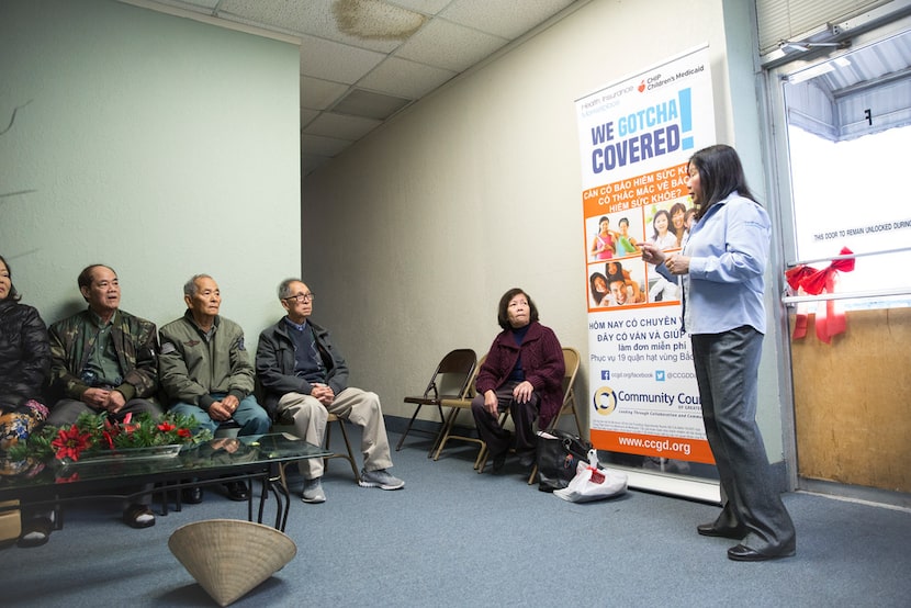 Lisa Pham, a Vietnamese-speaking health insurance marketplace navigator, speaks to a group...