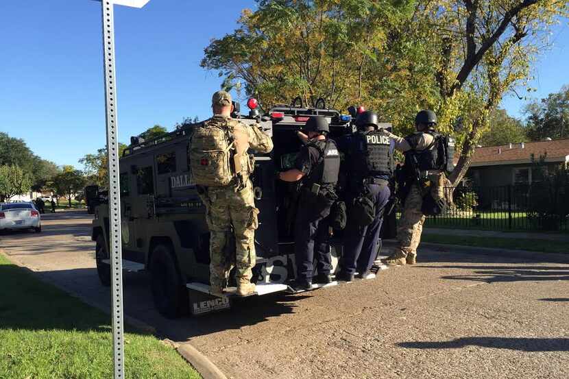  SWAT officers were later dispatched to the neighborhood on Wilbur Street. (Shabnam...
