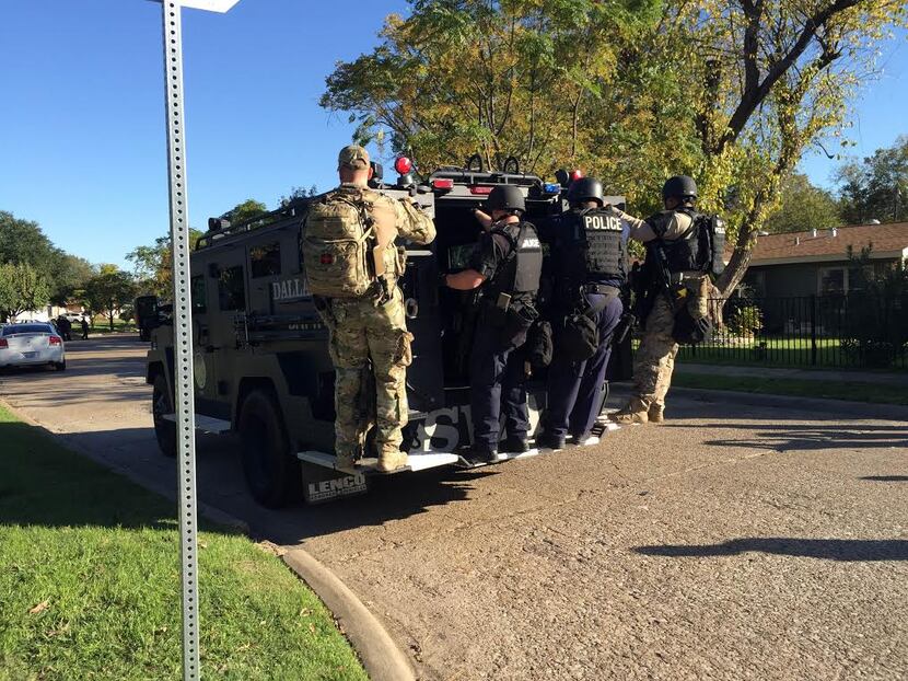  SWAT officers were later dispatched to the neighborhood on Wilbur Street. (Shabnam...