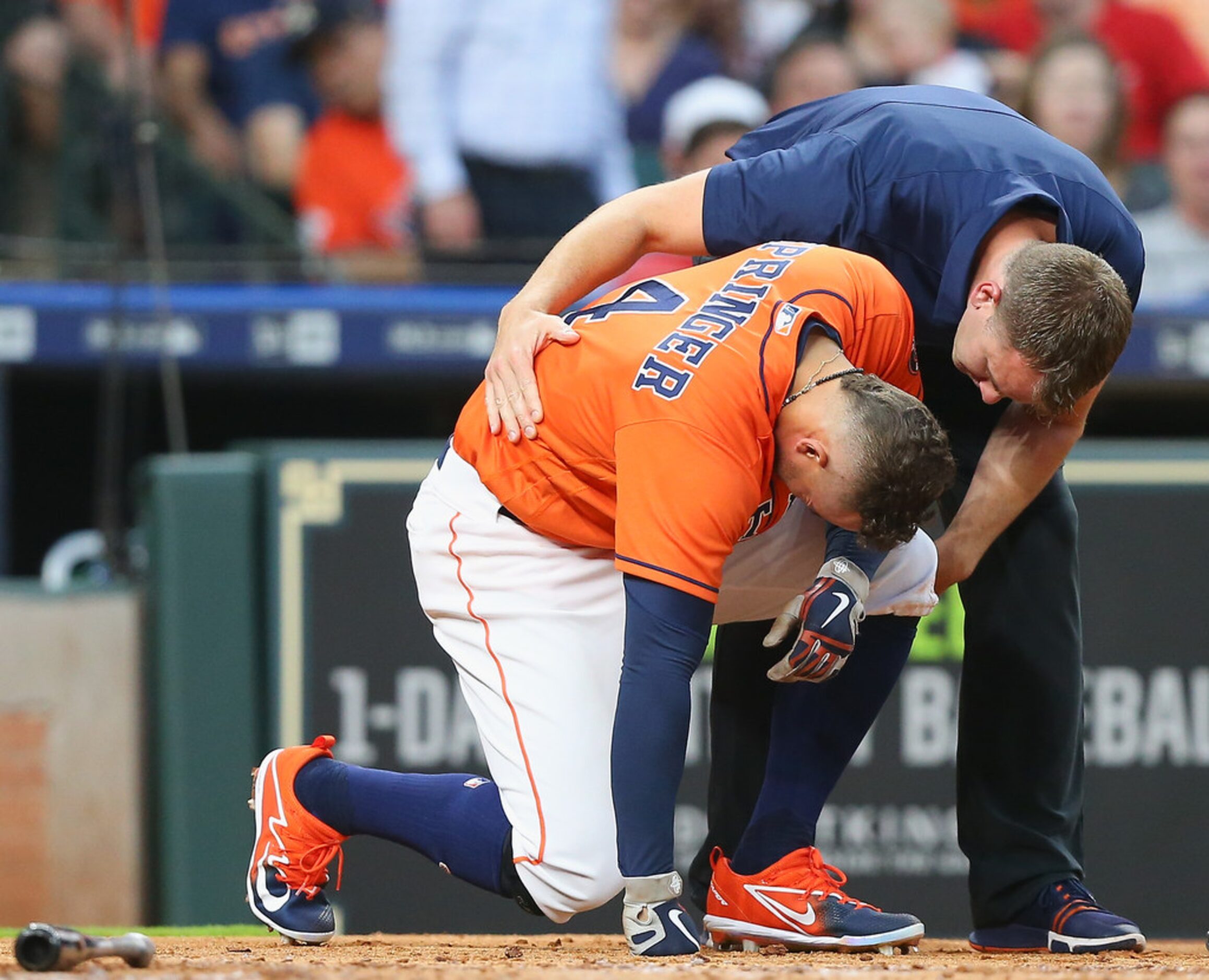 HOUSTON, TX - MAY 11:  George Springer #4 of the Houston Astros is looked at by Houston...