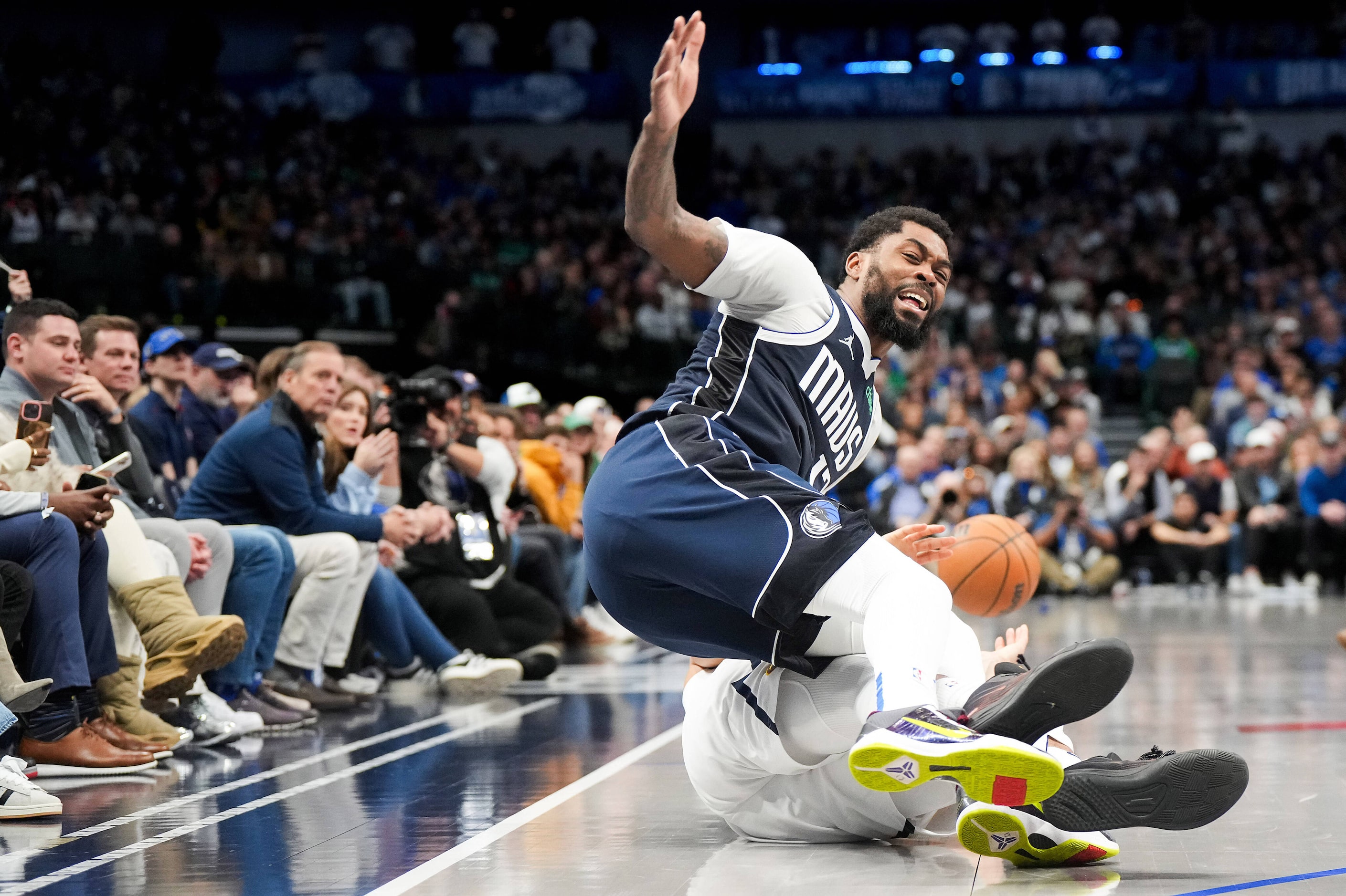 Dallas Mavericks forward Naji Marshall (13) collides with Denver Nuggets forward Michael...