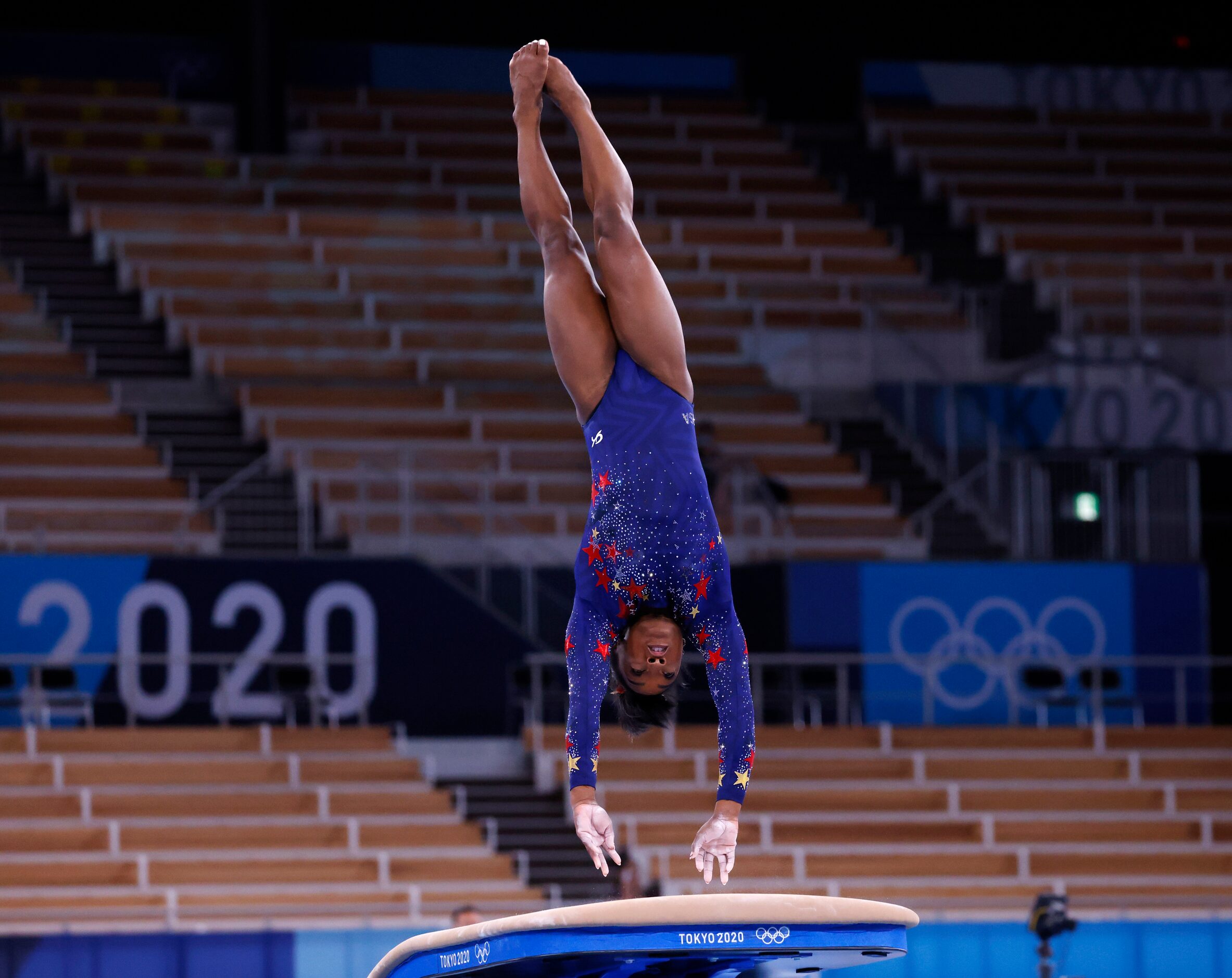 USA’s Simone Biles competes on the vault in a women’s gymnastics event during the postponed...