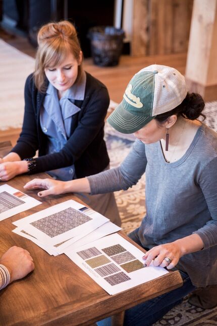  Joanna Gaines looks over sample textiles from Farmers Branch-based Loloi Rugs.