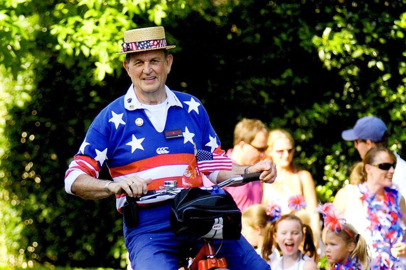 On July 4 , Jim Whorton will ride his high wheel bicycle in the Park Cities Fourth of July...
