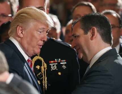 President Donald Trump talks with Texas Sen. Ted Cruz during a White House event regarding...