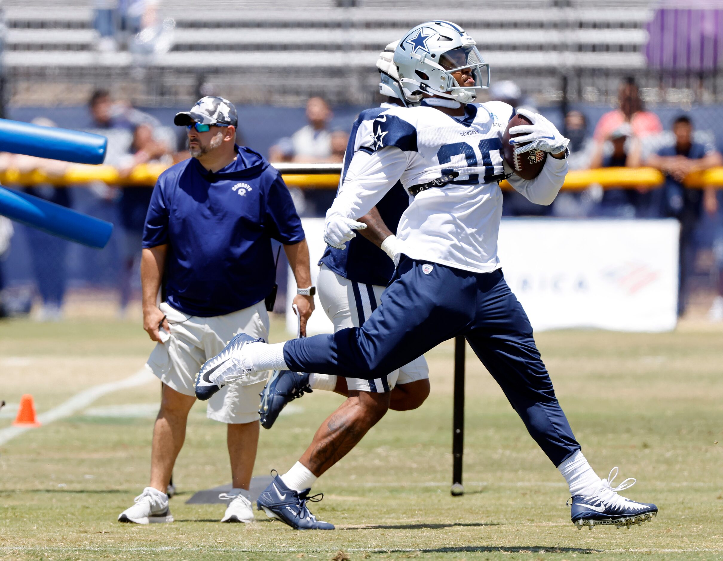 Dallas Cowboys running back Tony Pollard (20) finishing out a run down the sideline during...