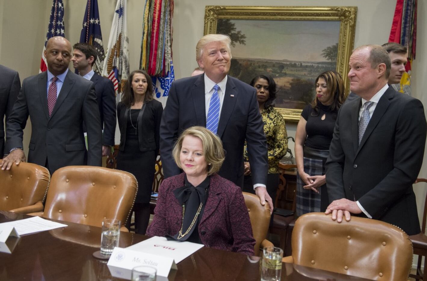 President Donald Trump pushed in the chair for Jill Soltau, then CEO of Jo-Ann stores,...