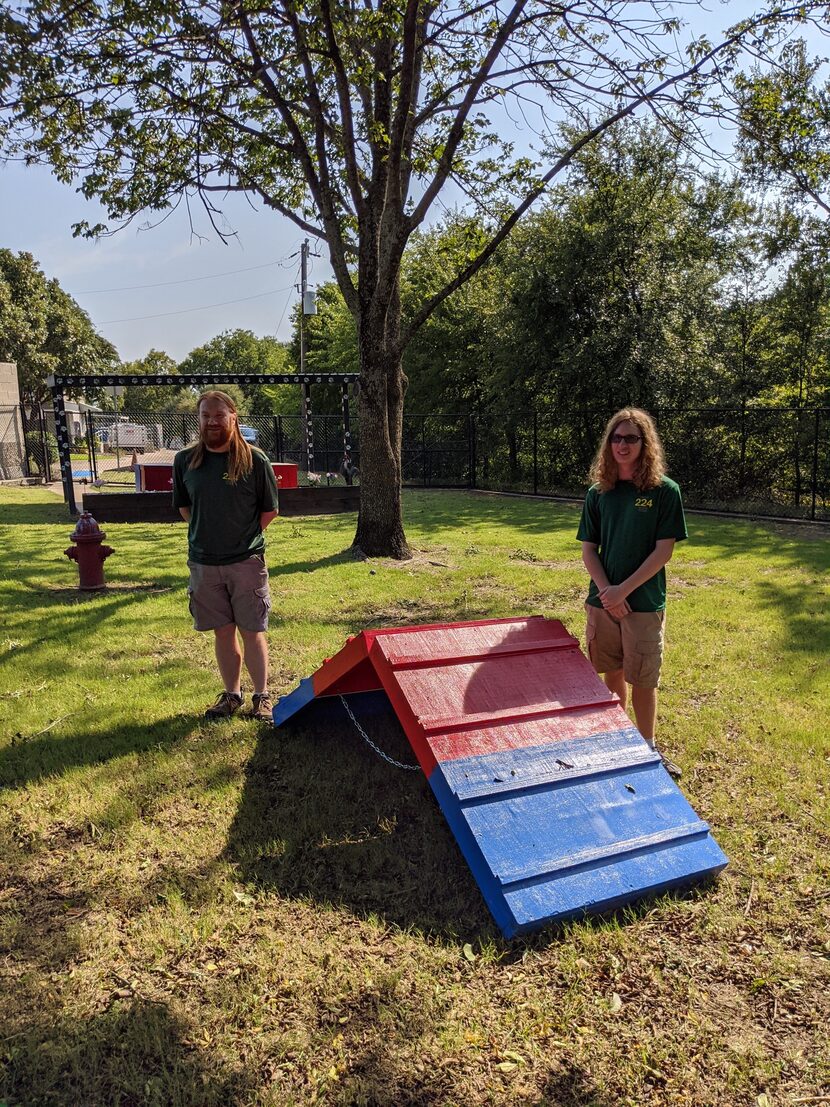 Father-son duo Michael and Ethan Garner built an A-frame outside of Allen Animal Shelter for...