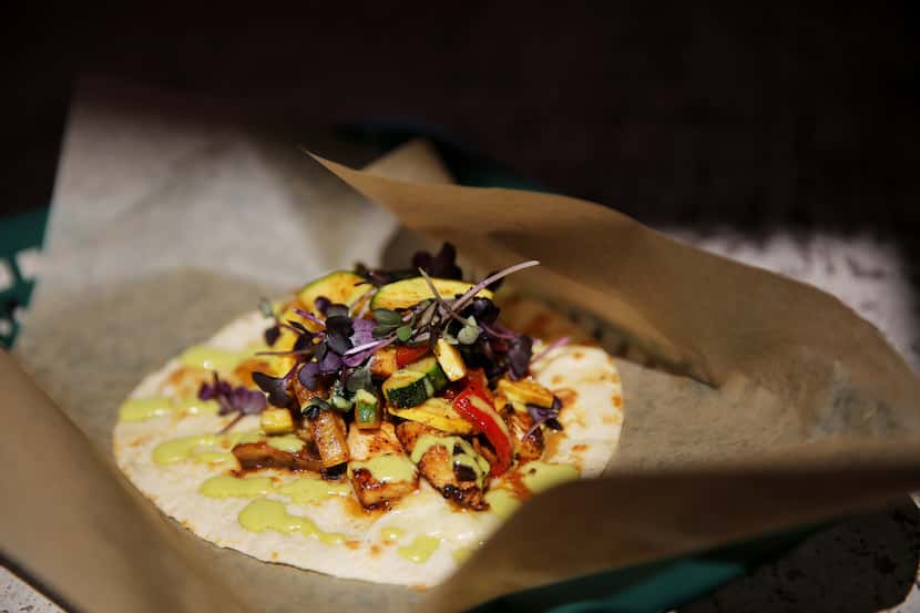The La Prensa taco from Tacos Mariachi was made with grilled chicken, sauteed vegetables,...
