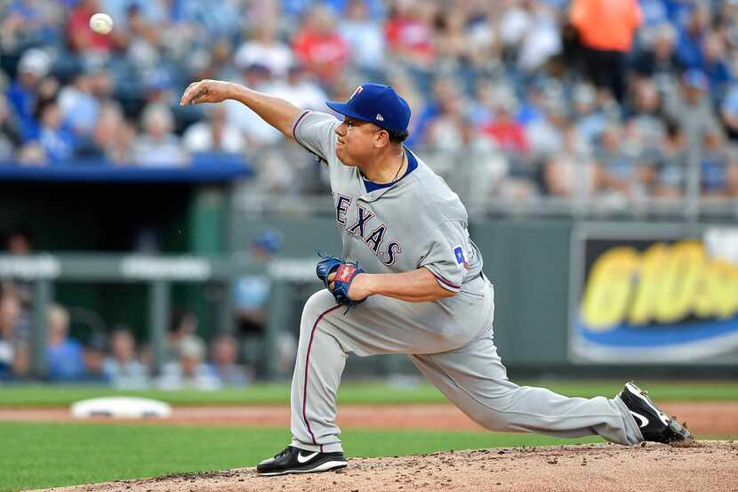 Texas Rangers starting pitcher Bartolo Colon throws in the second inning during Monday's...