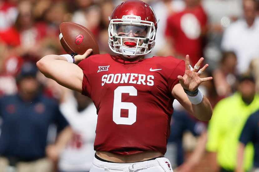 Oklahoma quarterback Baker Mayfield (6) throws a touchdown pass to tight end Grant...