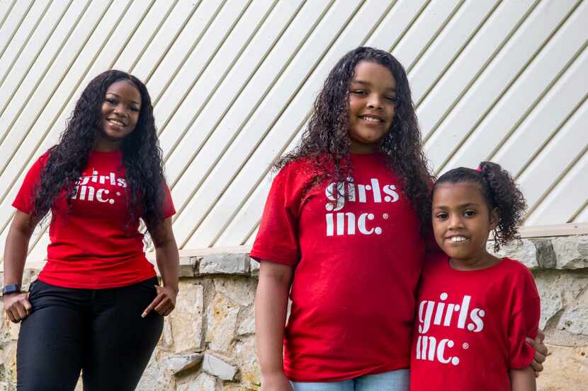 Girls Inc. program facilitator Natalie Cain (left) has continued to tutor sisters Aubrey...