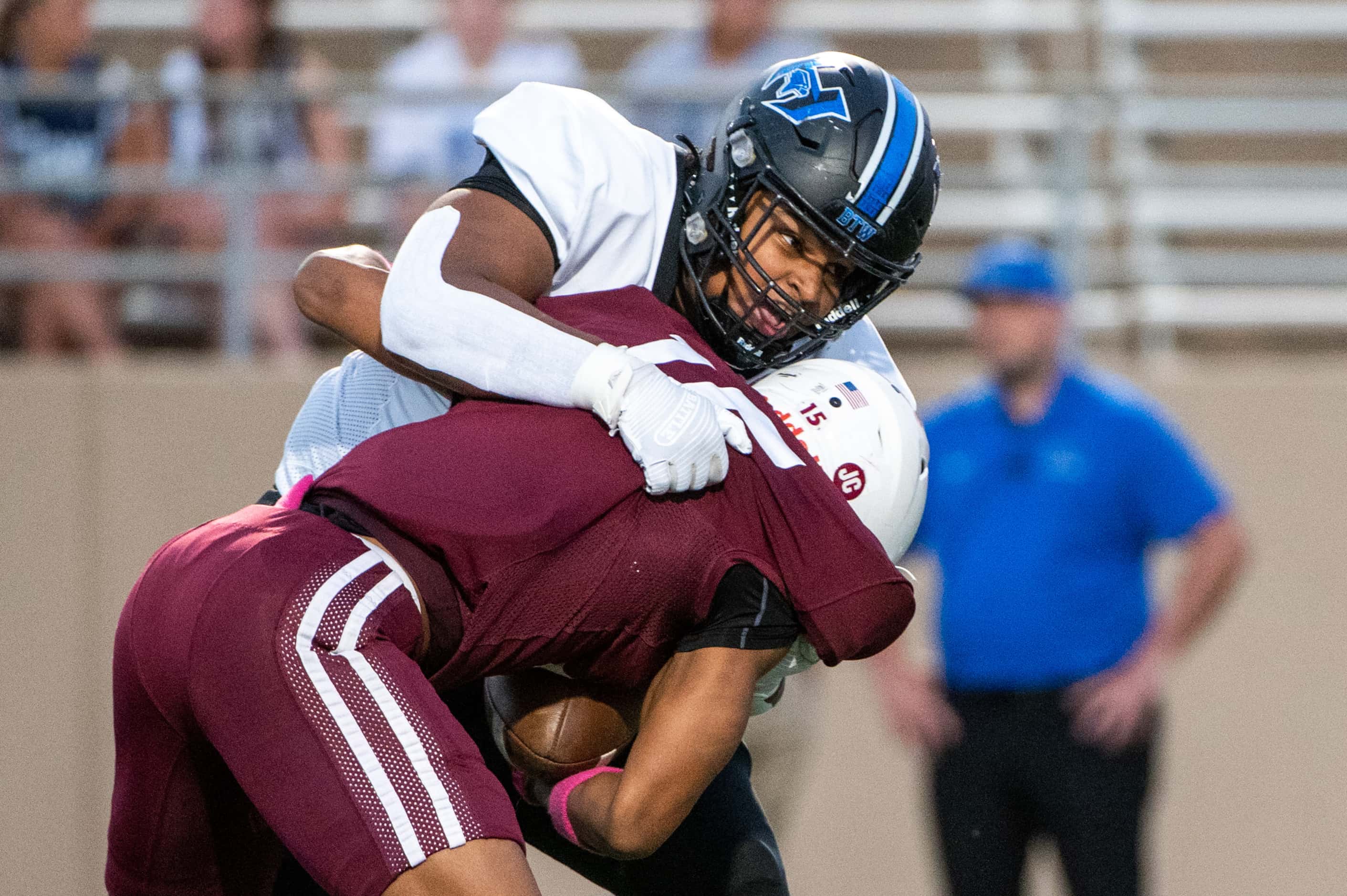 Hebron's William Cole (99) tackles Plano’s Josh Campbell (15) in the first half during a...