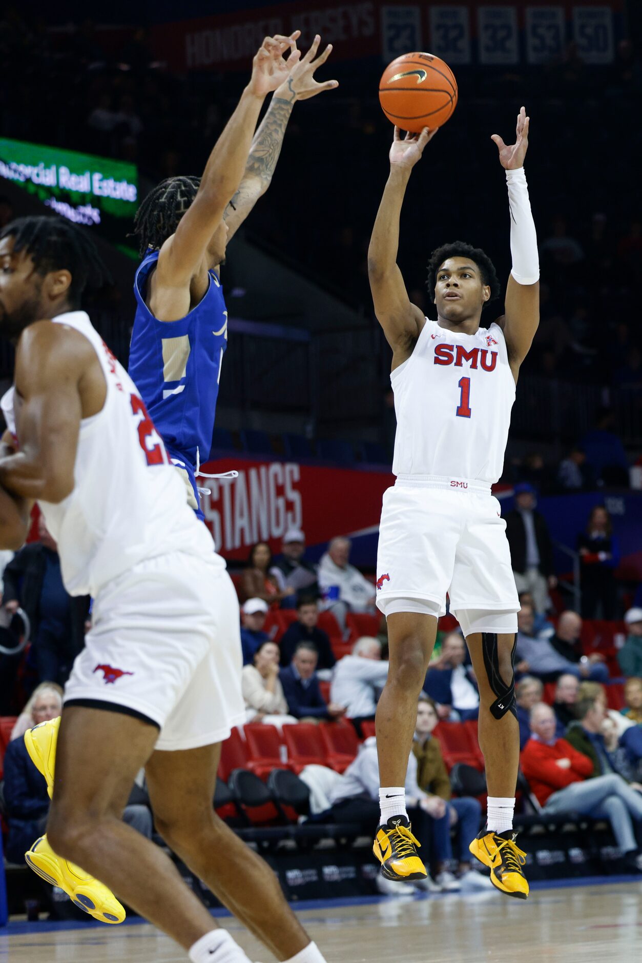 Southern Methodist guard Zhuric Phelps shoots a three pointer against the Tulsa during the...