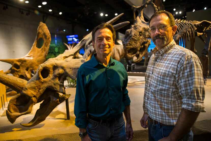 Paleontologists Tony Fiorillo (left) and Ron Tykoski attended the ribbon-cutting for the new...