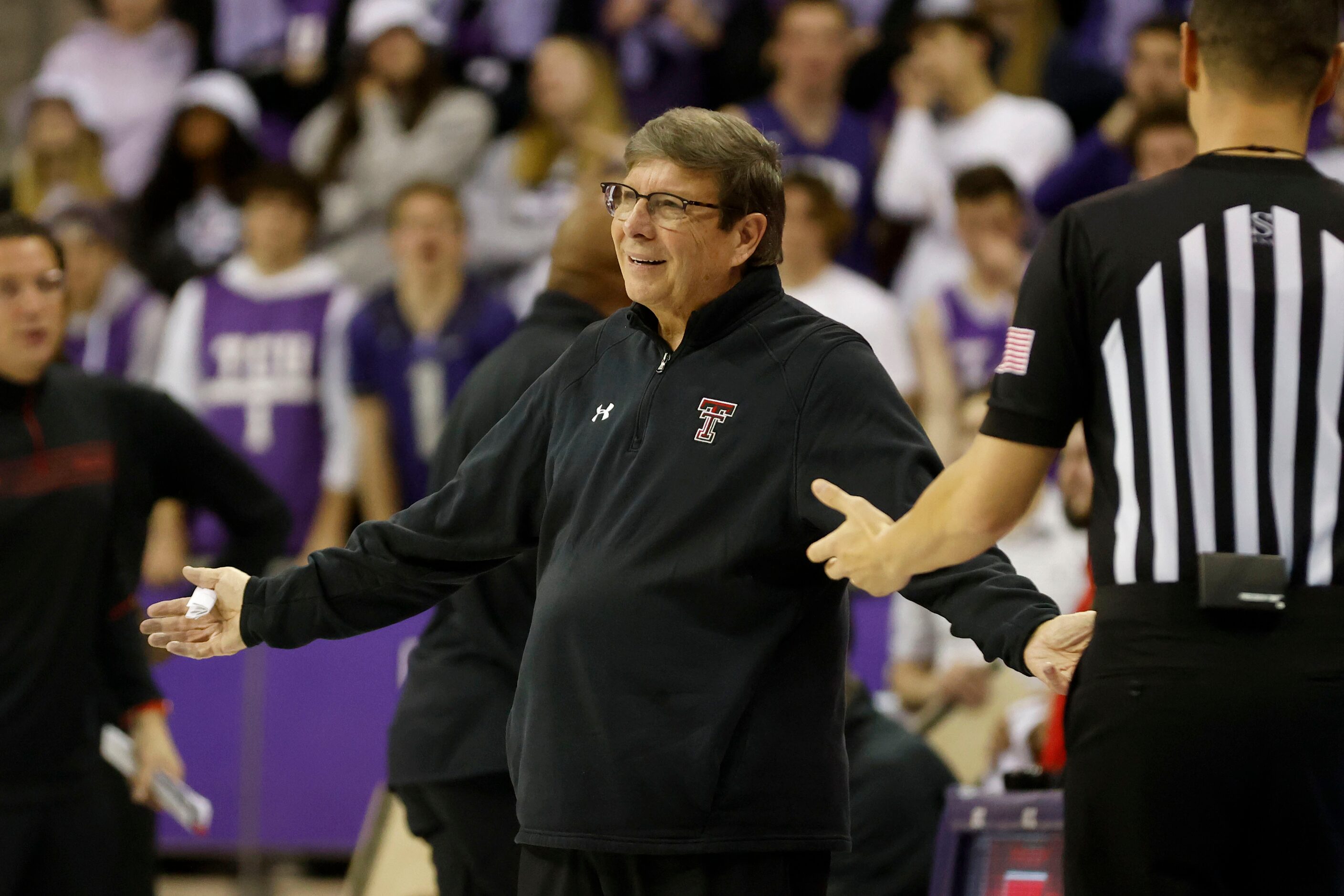 Texas Tech head coach Mark Adams reacts to play during the second half of their mens college...