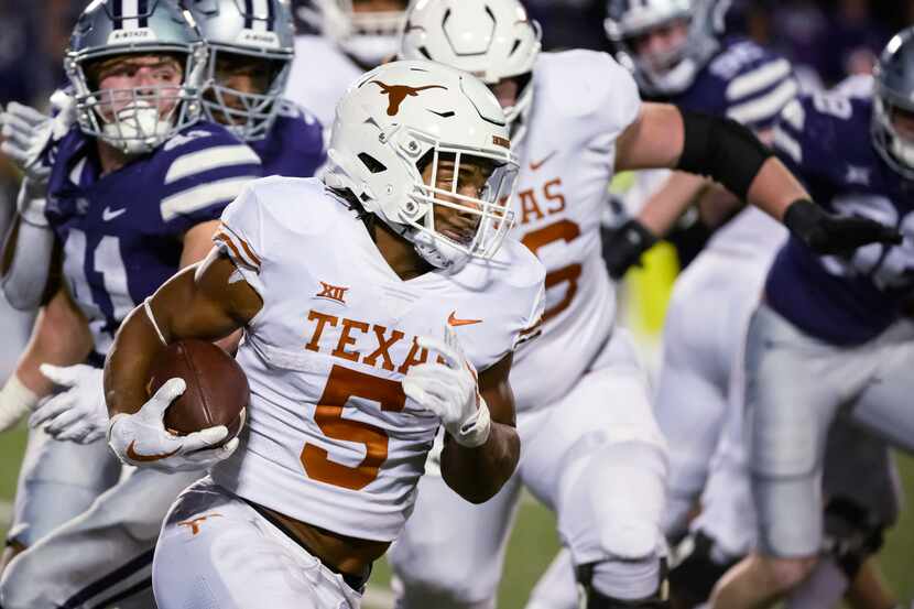 FILE - Texas running back Bijan Robinson (5) carries against Kansas State during the second...