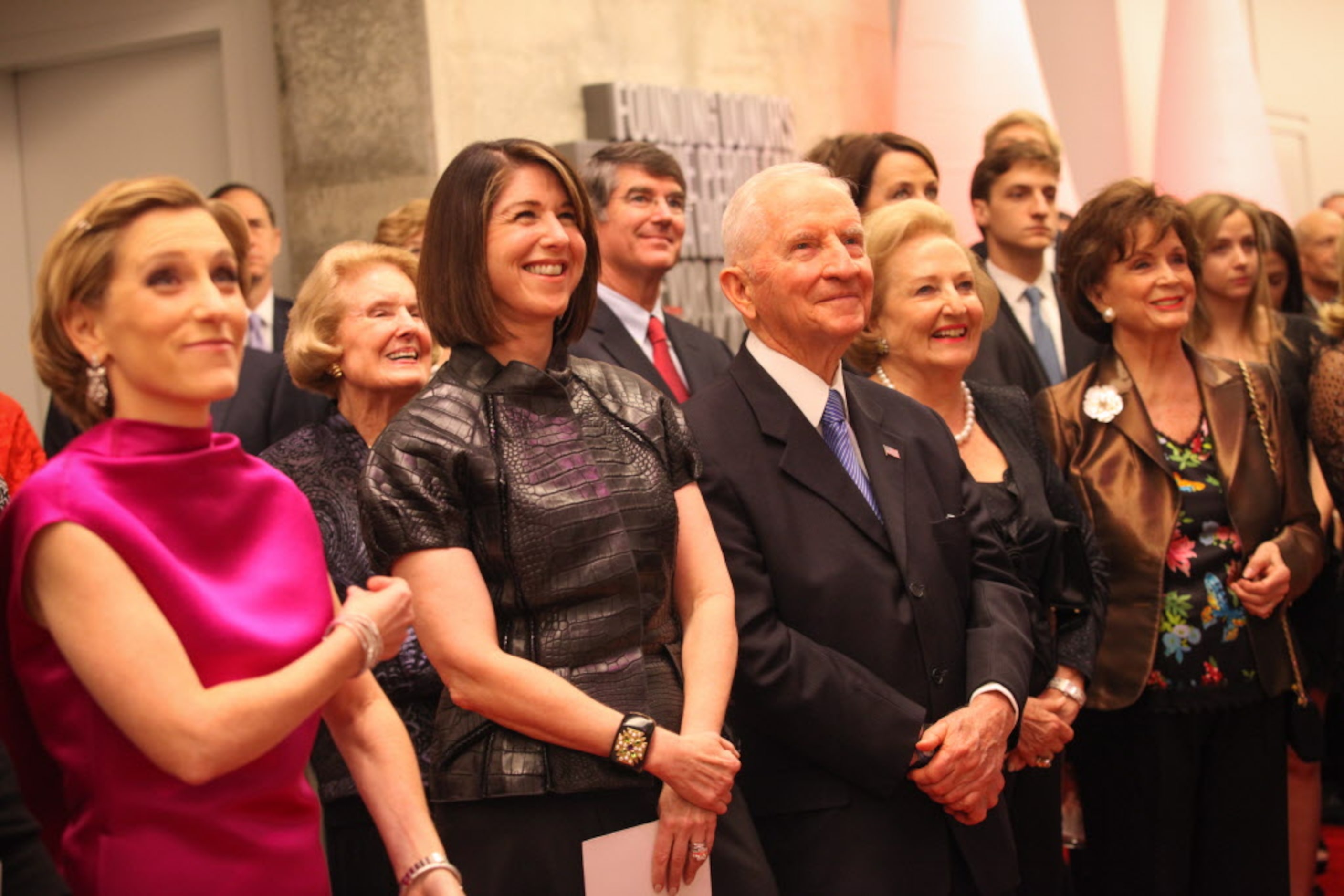 Nicole G. Small, Karen Katz, Ross Perot, and Margot Perot listen to architect Thom Mayne...