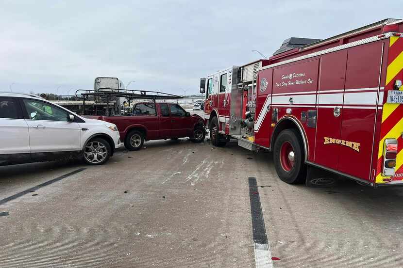 A crash involving "at least 8 vehicles," including a Grapevine Fire Department engine,...