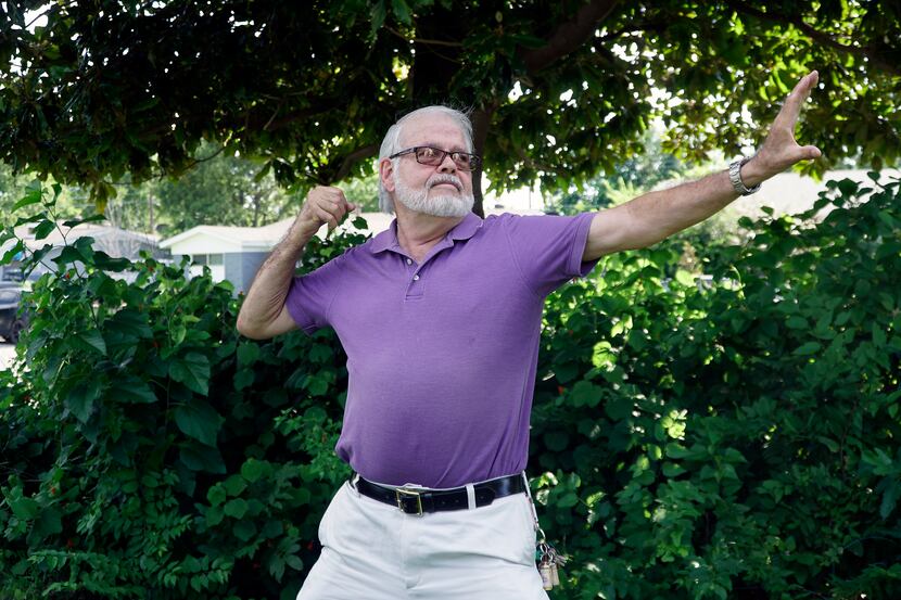 Richard Giltner practices qi gong outside his Fort Worth home. He credits the meditative...