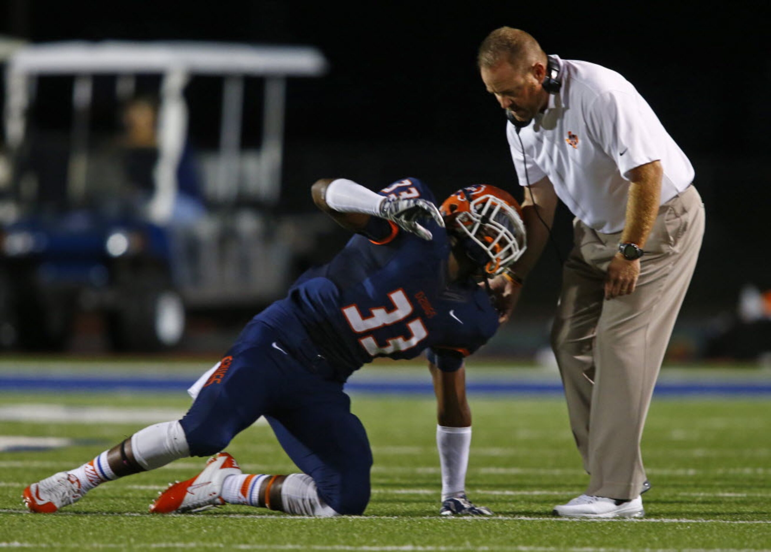 TXHSFB McKinney North defensive lineman Bryant Bailey (33) has difficulty getting off the...