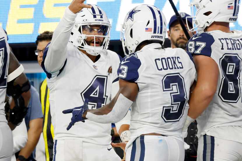 Dallas Cowboys wide receiver Brandin Cooks (3) is congratulated on his fourth quarter...